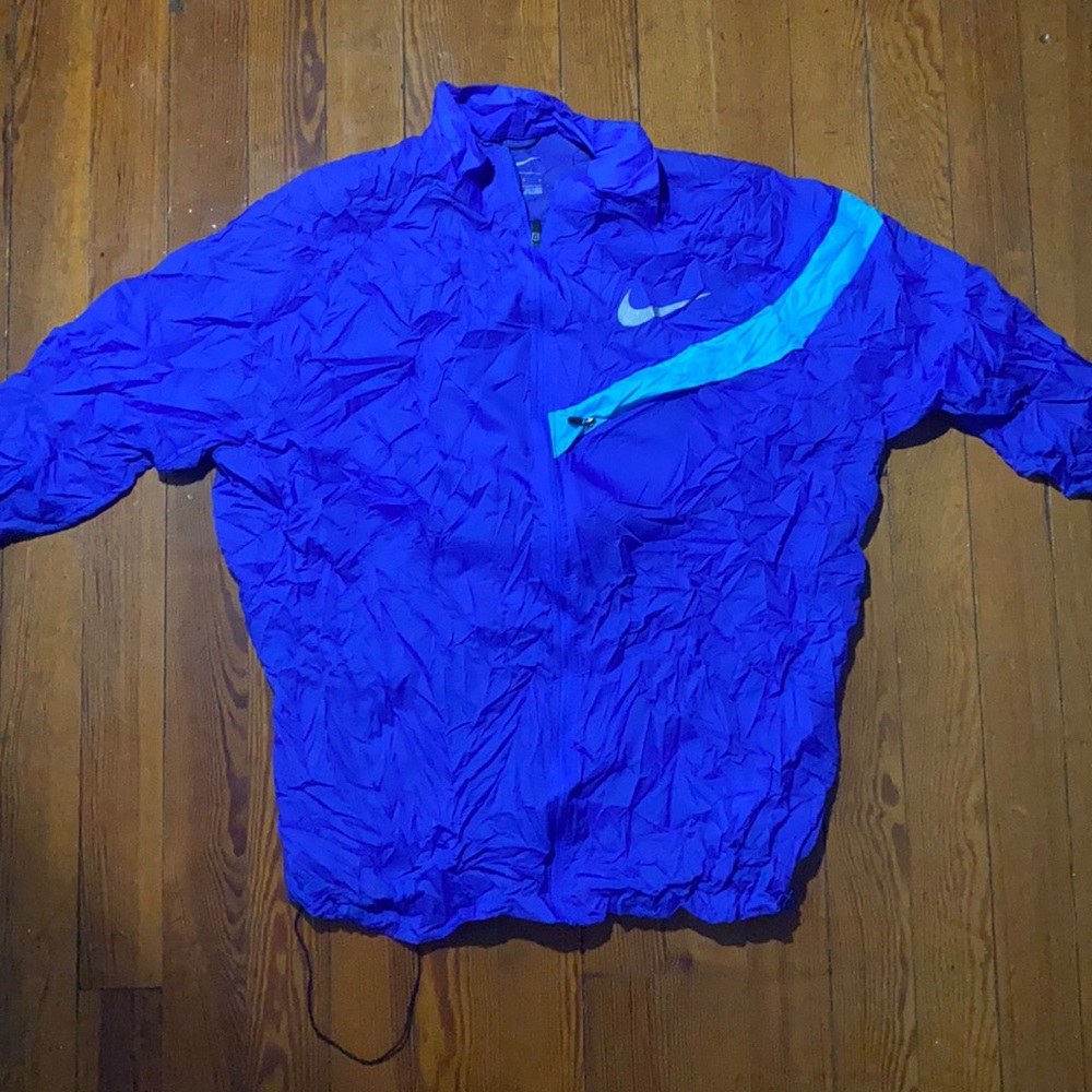 NIKE WINDBREAKER. BRAND NEW. NO TAGS.